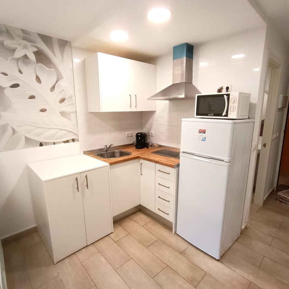 Kitchen or kitchenette, stove