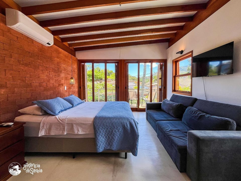 Casa c/ hidro em Ilhabela a poucos metros da praia House in Ilhabela