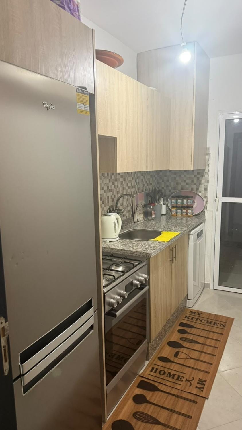 Kitchen or kitchenette, dishwasher, stove