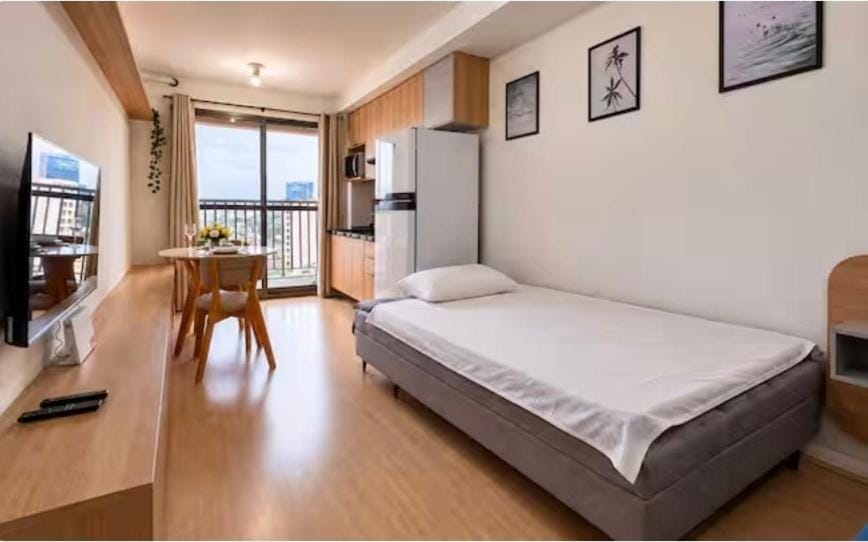 Conforto e praticidade no centro do Rio studio para quatro pessoas com piscina, academia e metrô na porta Apartment in Rio de Janeiro
