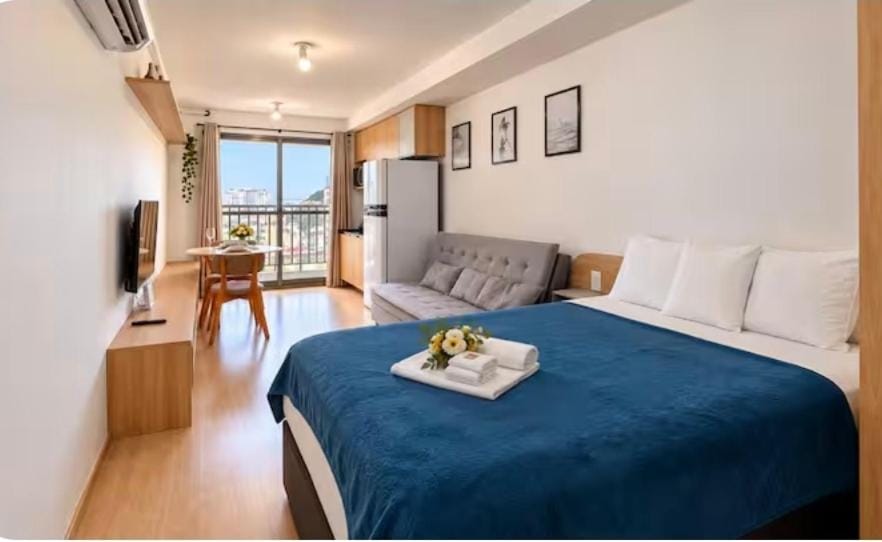 Conforto e praticidade no centro do Rio studio para quatro pessoas com piscina, academia e metrô na porta Apartment in Rio de Janeiro
