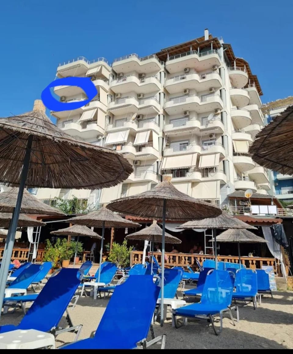 Property building, Day, Natural landscape, Beach, sunbed