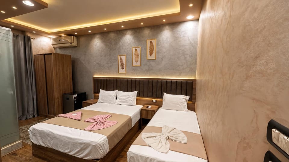 Bed, Photo of the whole room, Bedroom, towels, air conditioner