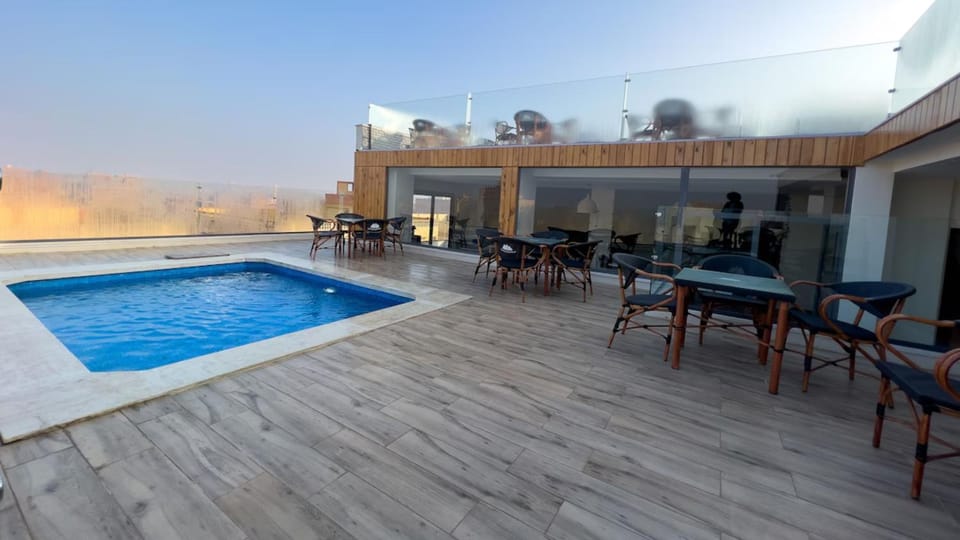 Property building, Restaurant/places to eat, Swimming pool