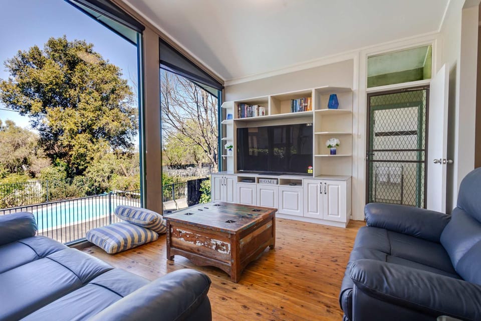 Living room, Seating area, Pool view, Swimming pool