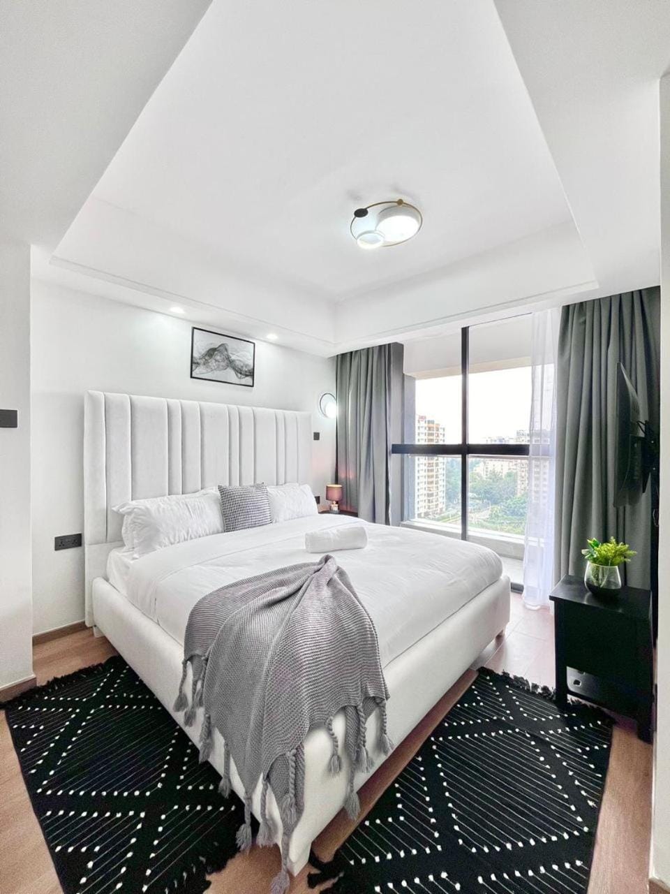 classy tastefully furnished executive three bedroom apartment with fully equipped gym ample parking space swimming pool children playing ground and amazing scenic views Apartment in Nairobi County