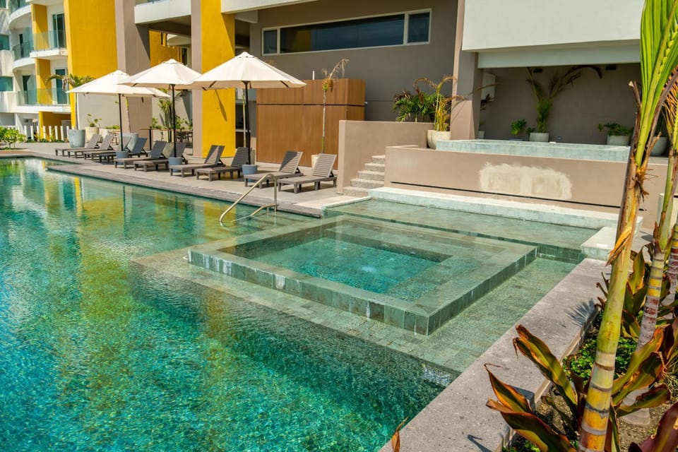 Property building, Patio, Day, Pool view, Swimming pool, sunbed