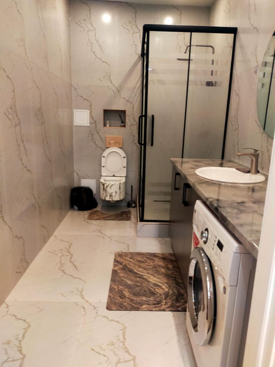Shower, Toilet, Bathroom, towels, washing machine, dryer