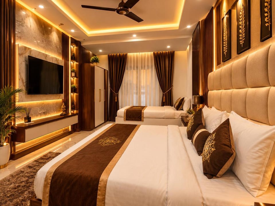 Communal lounge/ TV room, Bed, TV and multimedia, Living room, Photo of the whole room, Seating area, Evening entertainment, Bedroom, fireplace, air conditioner