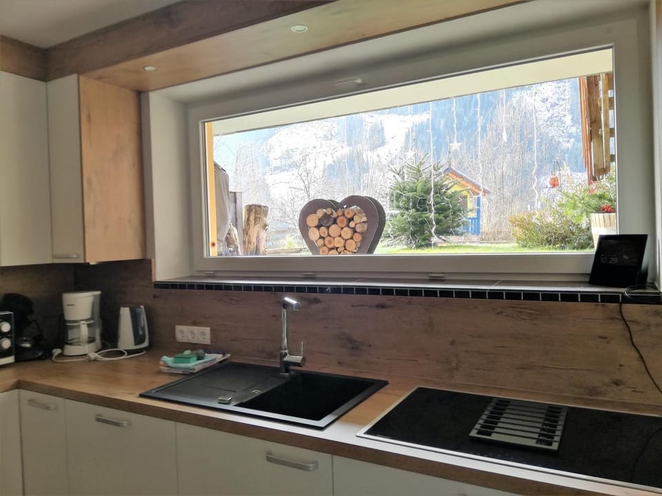 Kitchen or kitchenette, stove, kitchen
