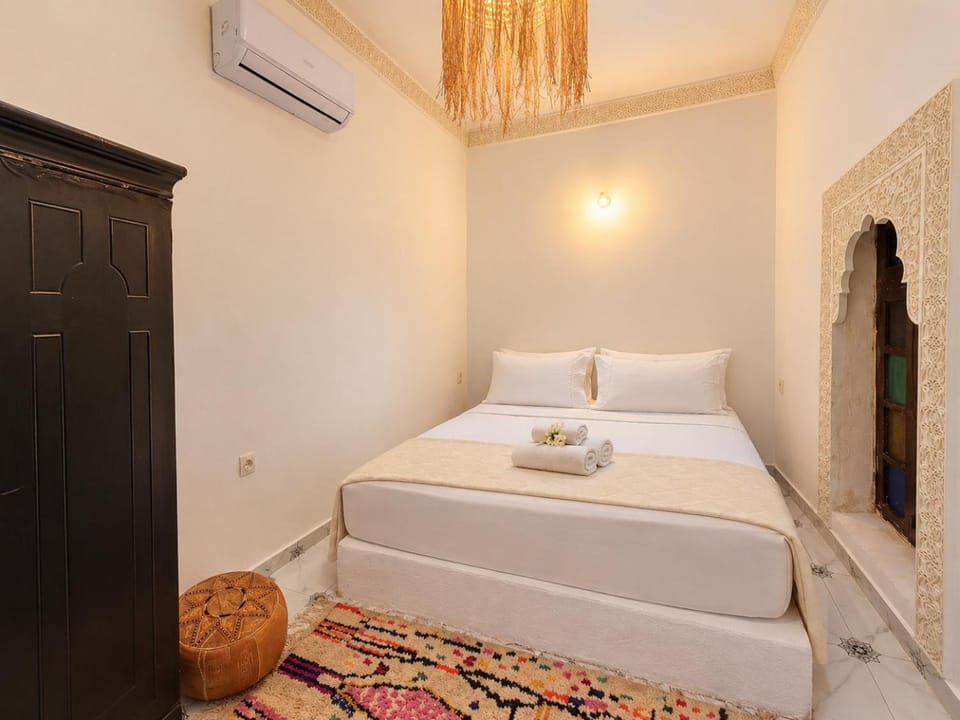 Bed, Photo of the whole room, Bedroom, towels, air conditioner