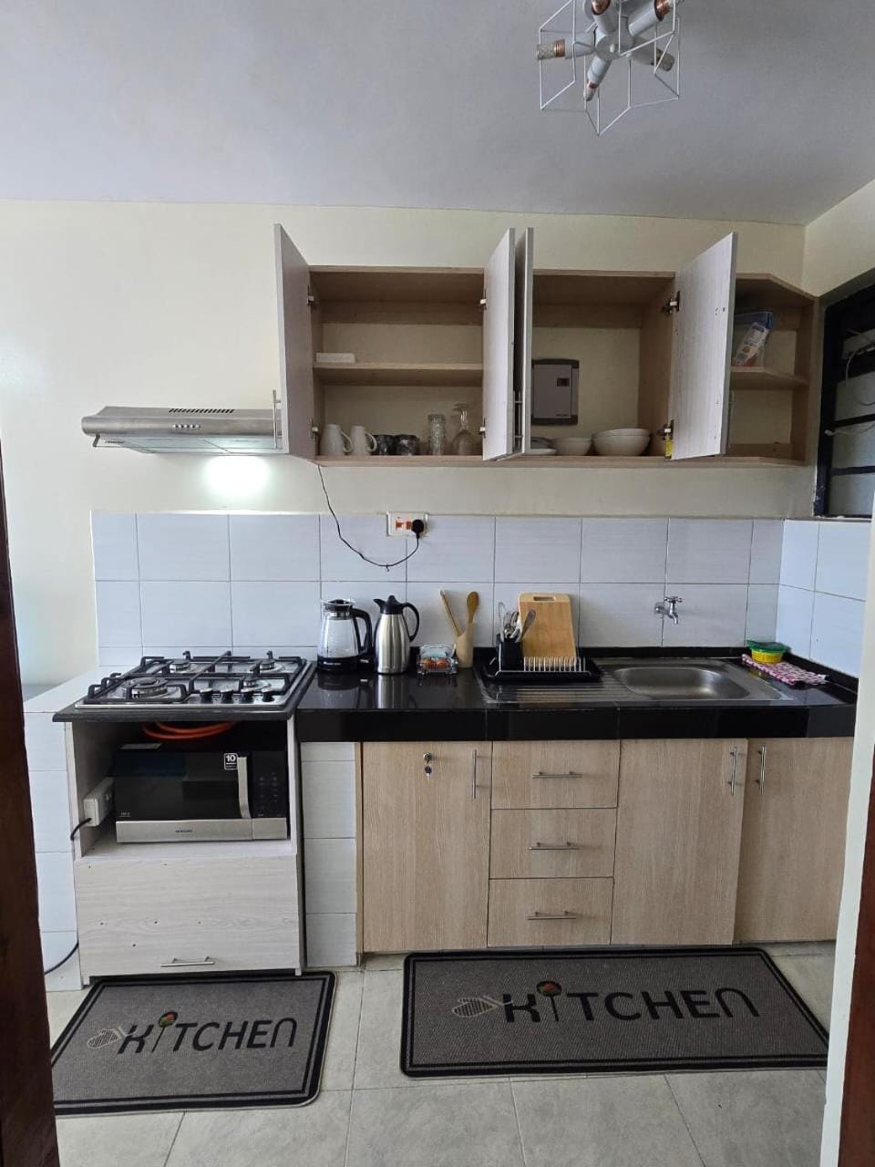 Kitchen or kitchenette, stove