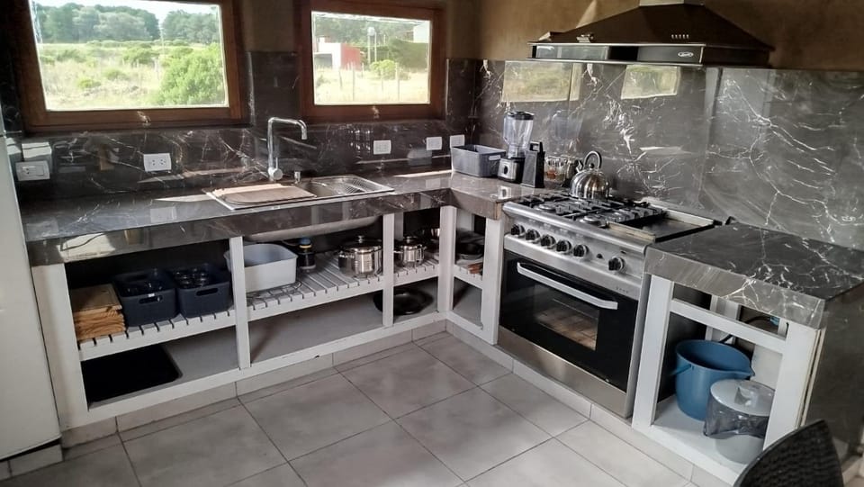 Kitchen or kitchenette, dishwasher, stove