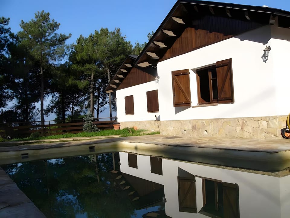 Property building, Living room, Swimming pool