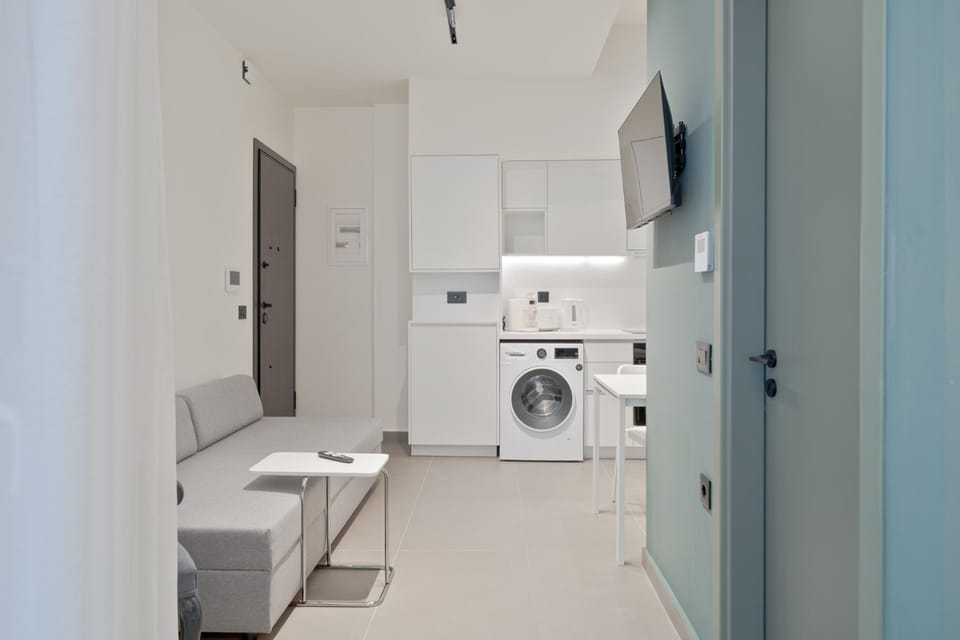 Kitchen or kitchenette, washing machine