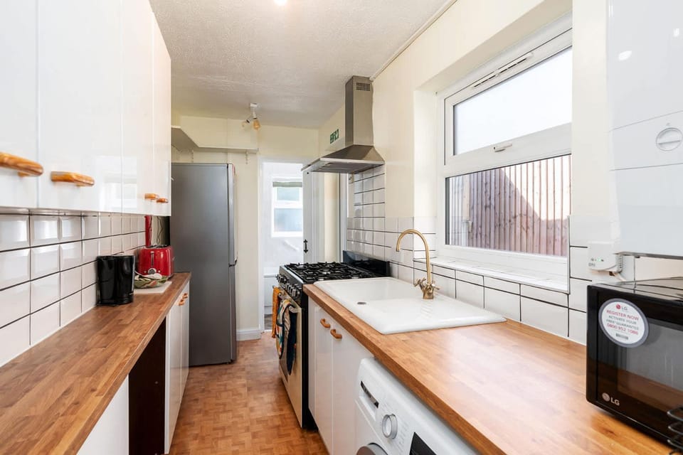 Kitchen or kitchenette, oven, stove, toaster