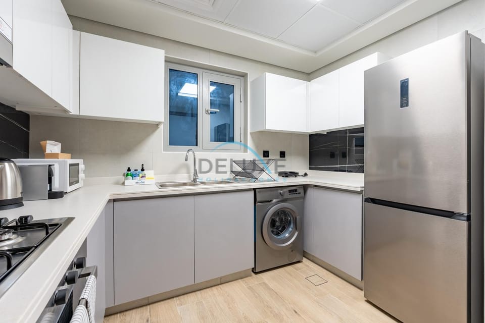 microwave, oven, stove, washing machine, kitchen