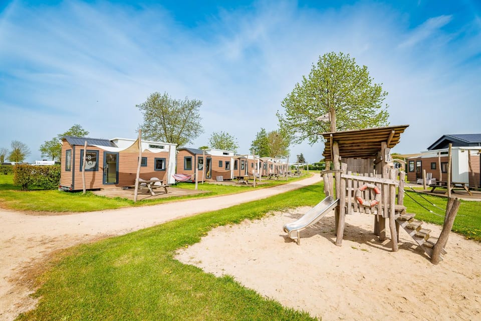Property building, Children play ground, Garden view