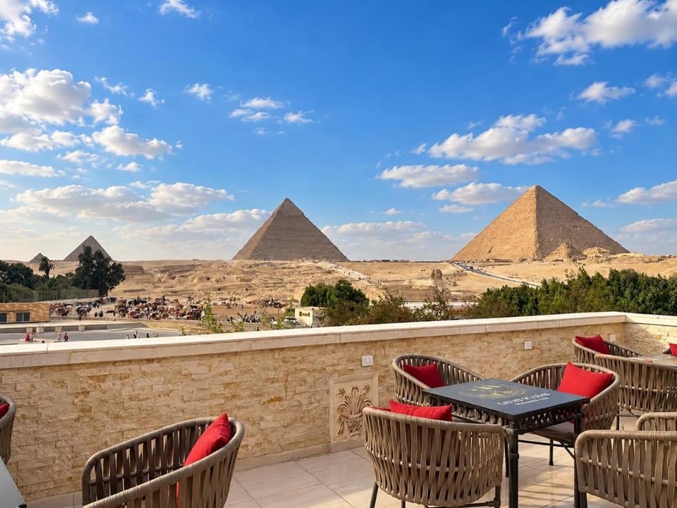 Patio, Nearby landmark, Day, Natural landscape, View (from property/room), Balcony/Terrace, Living room, Seating area, Dining area