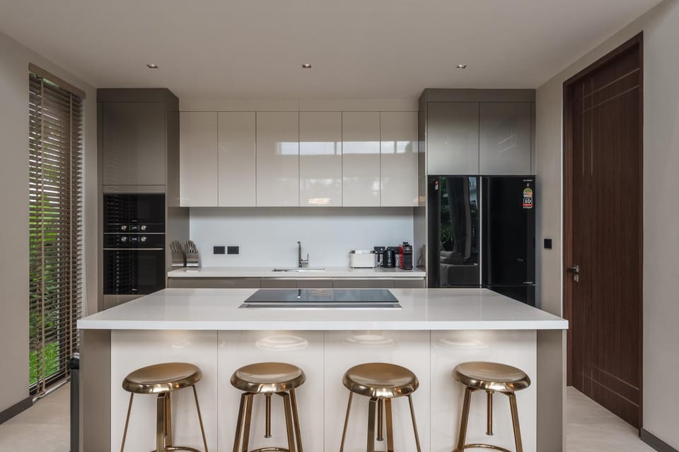 Kitchen or kitchenette, dishwasher, oven, stove