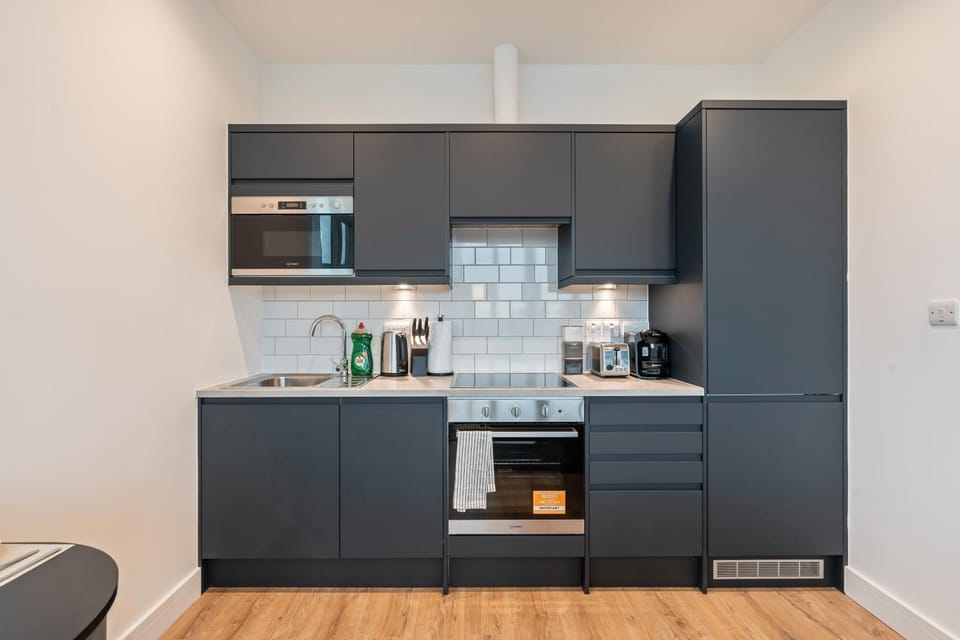 Kitchen or kitchenette, oven, stove