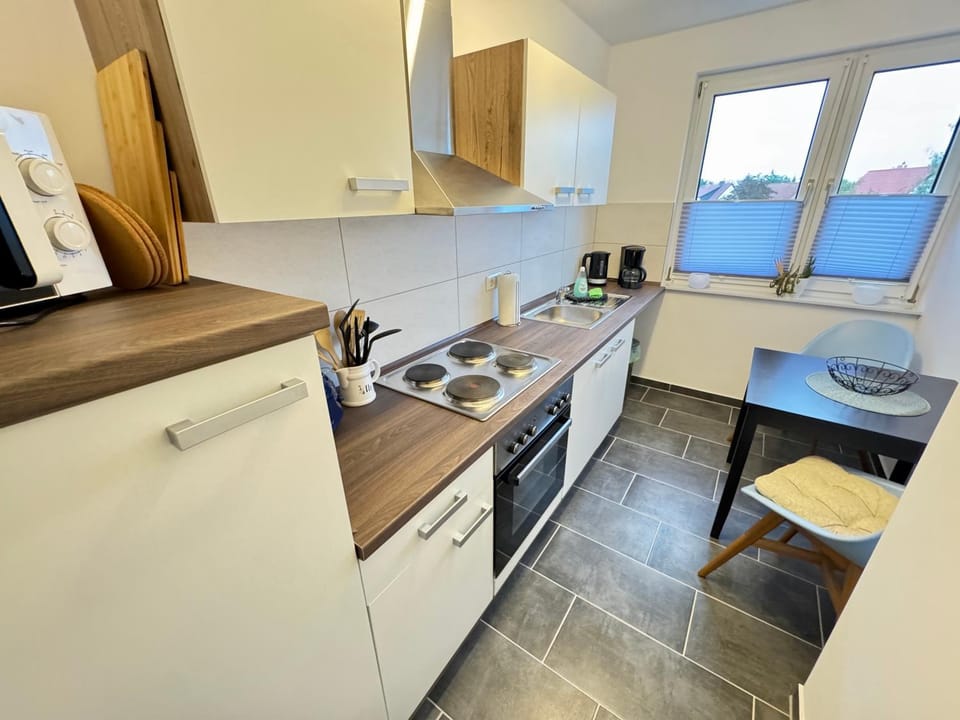 Kitchen or kitchenette, Dining area, oven, stove, toaster