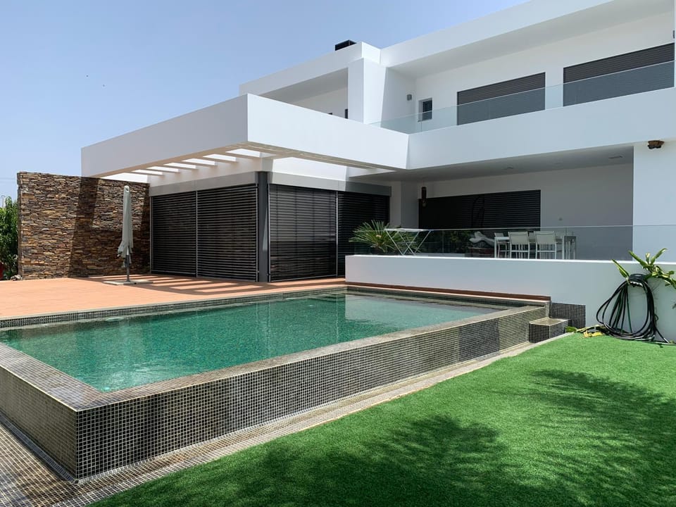 Property building, Living room, Swimming pool
