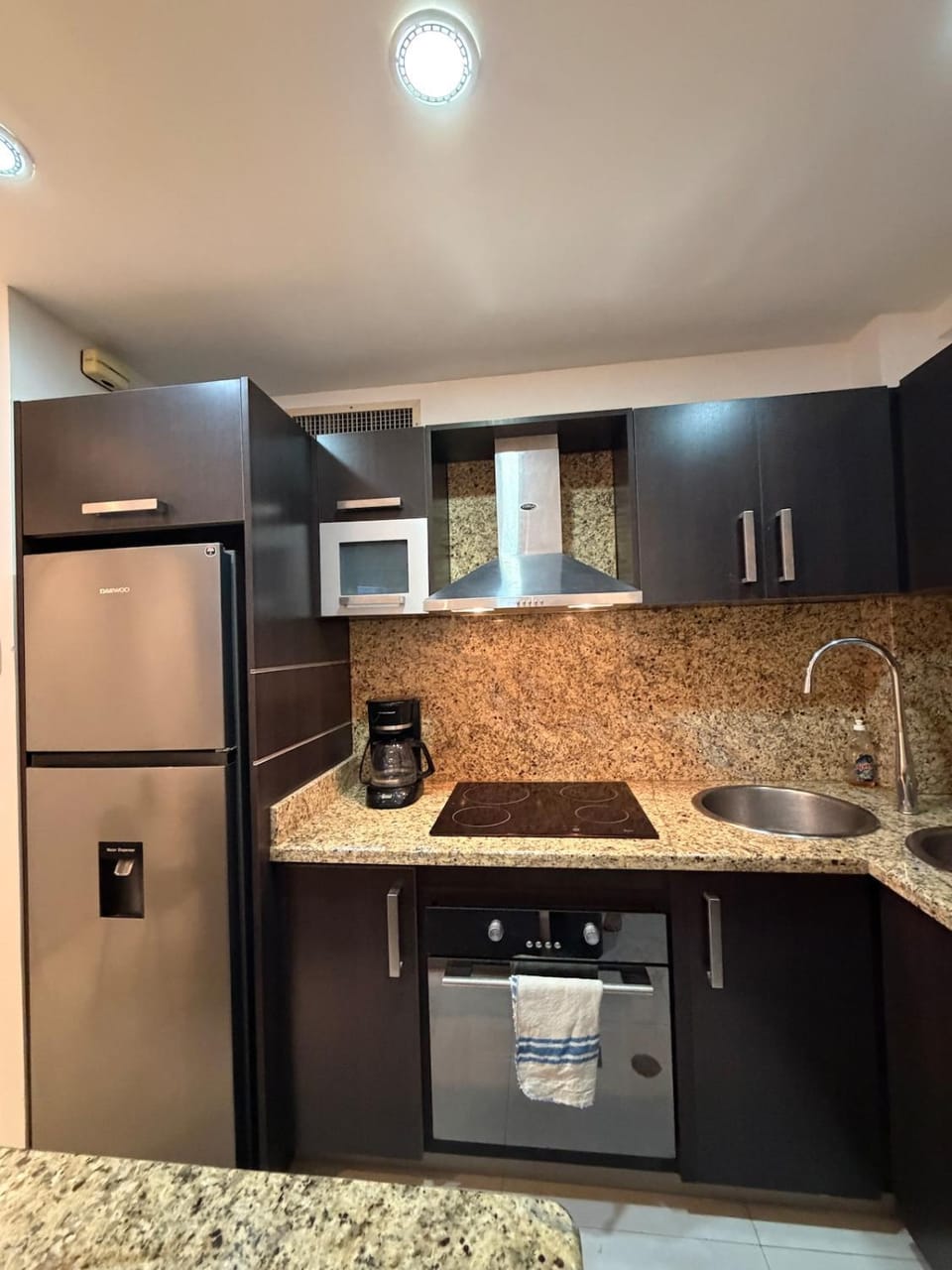 Kitchen or kitchenette, oven