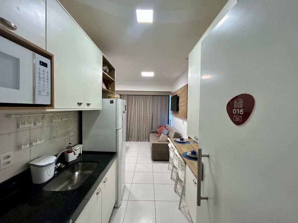 Varanda frente piscina no Mana Beach | Muro Alto Apartment in Ipojuca