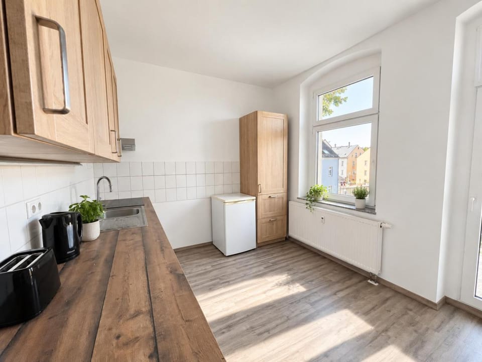 Kitchen or kitchenette, dishwasher, microwave, oven, stove, toaster, kitchen