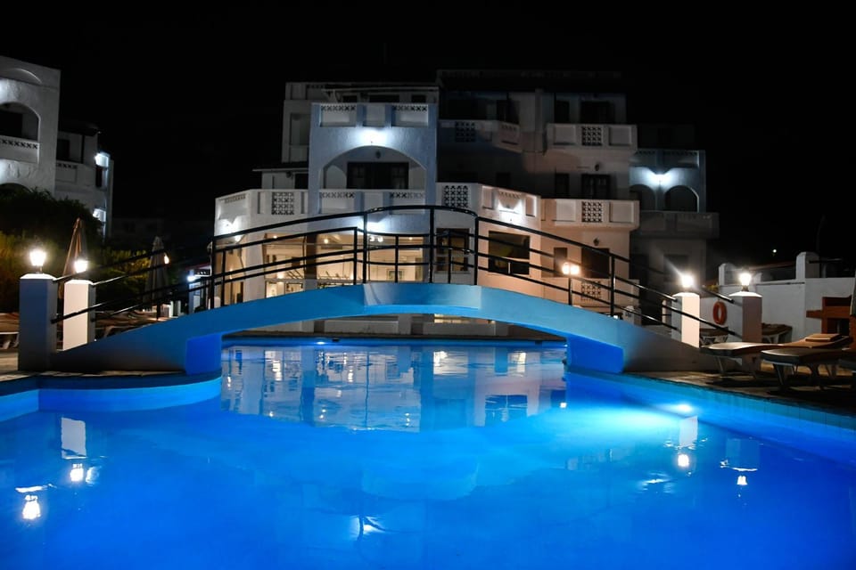 Property building, Night, Pool view, Swimming pool