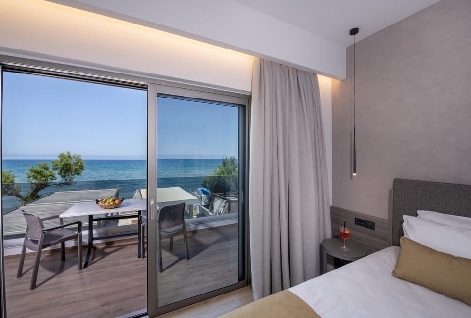 Bed, View (from property/room), Living room, Photo of the whole room, Beach, Sea view