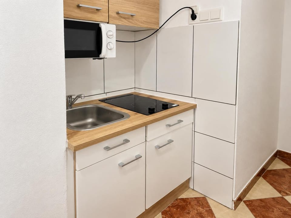 Kitchen or kitchenette, stove