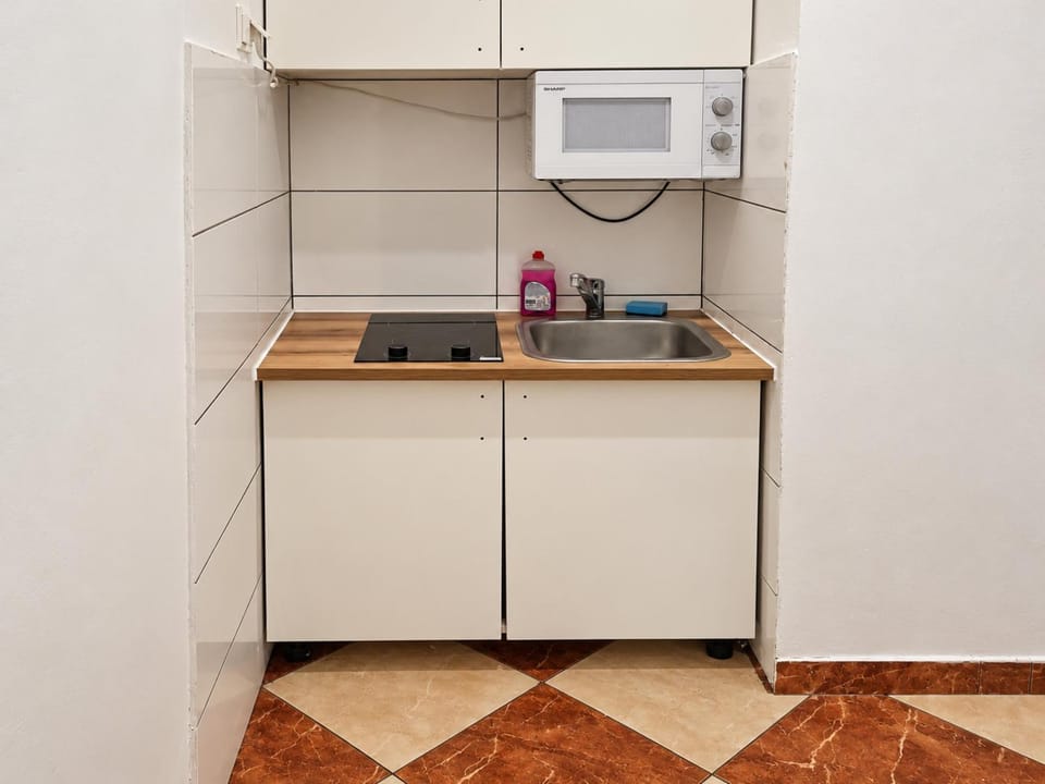 Kitchen or kitchenette, stove