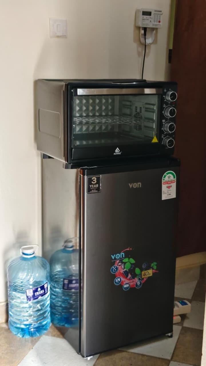 Kitchen or kitchenette, oven