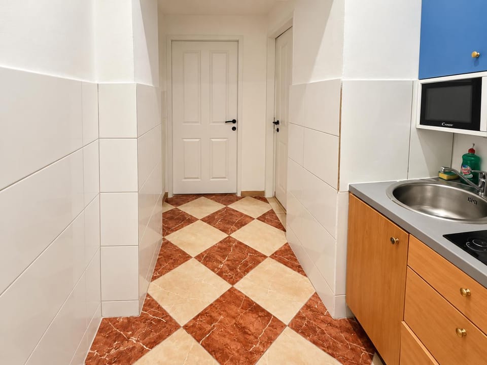 Kitchen or kitchenette, stove