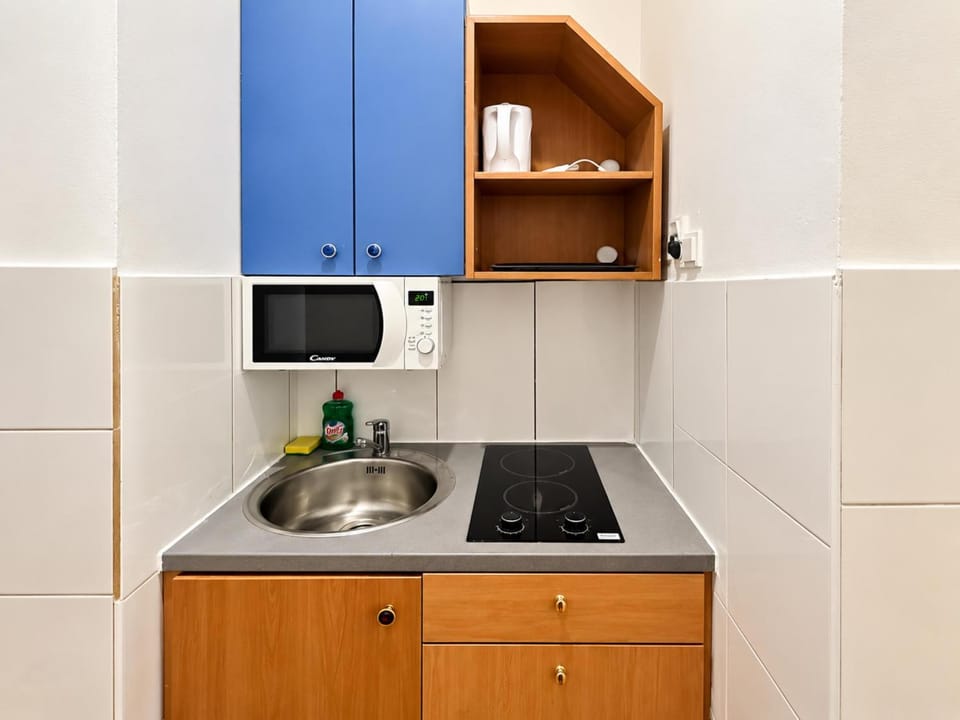Kitchen or kitchenette, stove