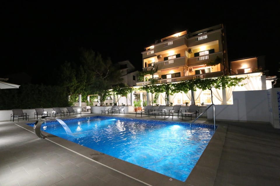 Property building, Night, Balcony/Terrace, Pool view, Swimming pool, Swimming pool