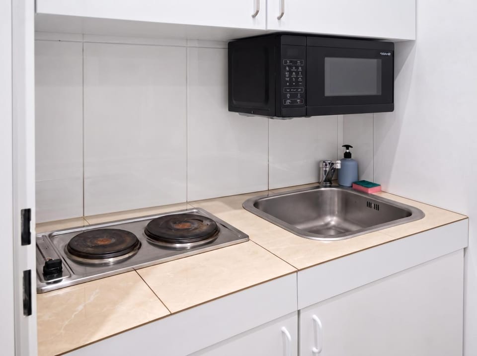Kitchen or kitchenette, stove