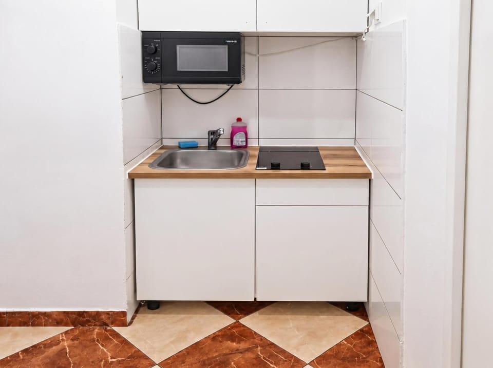 Kitchen or kitchenette, stove