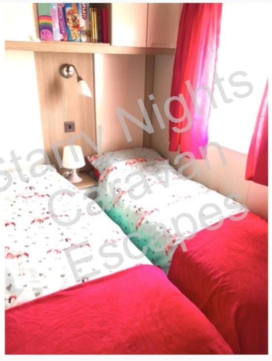 Deluxe 3 bedroomed caravan on Presthaven with Ramped decking House in Llanasa