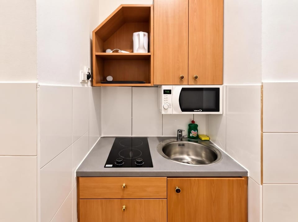 Kitchen or kitchenette, stove