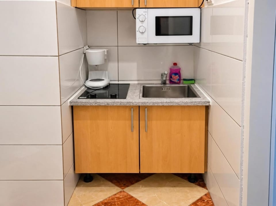 Kitchen or kitchenette, stove