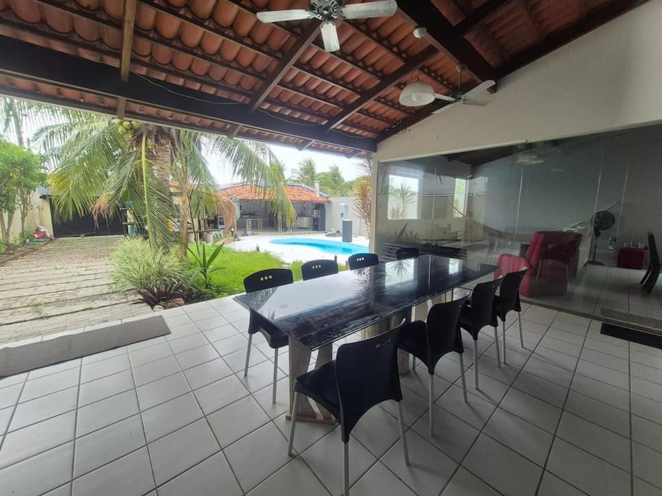 Patio, Seating area, Dining area, Pool view, Swimming pool