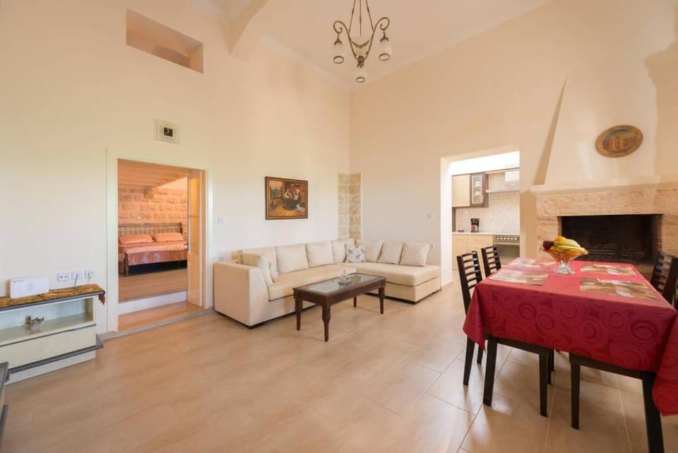 Property building, Living room, Seating area, Dining area, flat iron