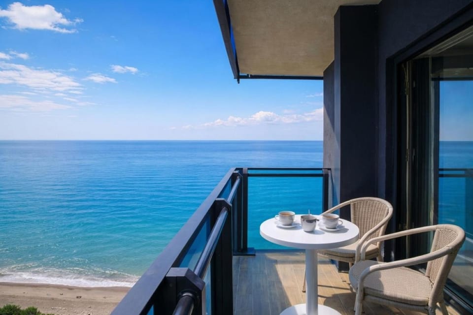 Patio, Day, Natural landscape, View (from property/room), Balcony/Terrace, Living room, Seating area, Dining area, Beach, Sea view