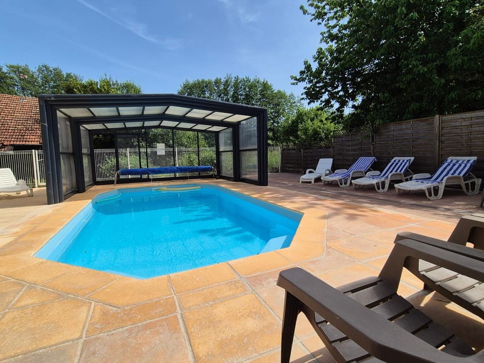 Property building, Living room, Swimming pool