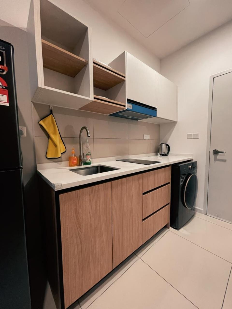Kitchen or kitchenette, dishwasher, minibar, stove, washing machine, dryer