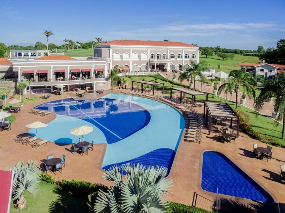 Property building, Day, Natural landscape, Pool view, Swimming pool, sunbed