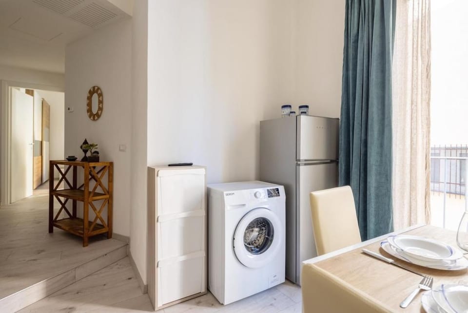 Kitchen or kitchenette, washing machine